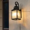 26280e10-a268-49af-b67a-000ca2be1fe5.jpg Large Outdoor Wall Light with Clear Glass – Matte Black Aluminum, Supports Multiple Bulbs, Hardwired Installation (1-Pack)