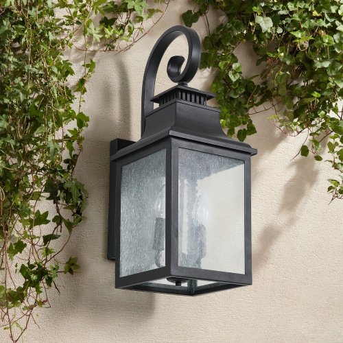 9a6f87e8-0bc7-4117-807d-6c60c79ff74d.jpg Large Outdoor Wall Light with Clear Glass – Matte Black Aluminum, Supports Multiple Bulbs, Hardwired Installation (1-Pack)